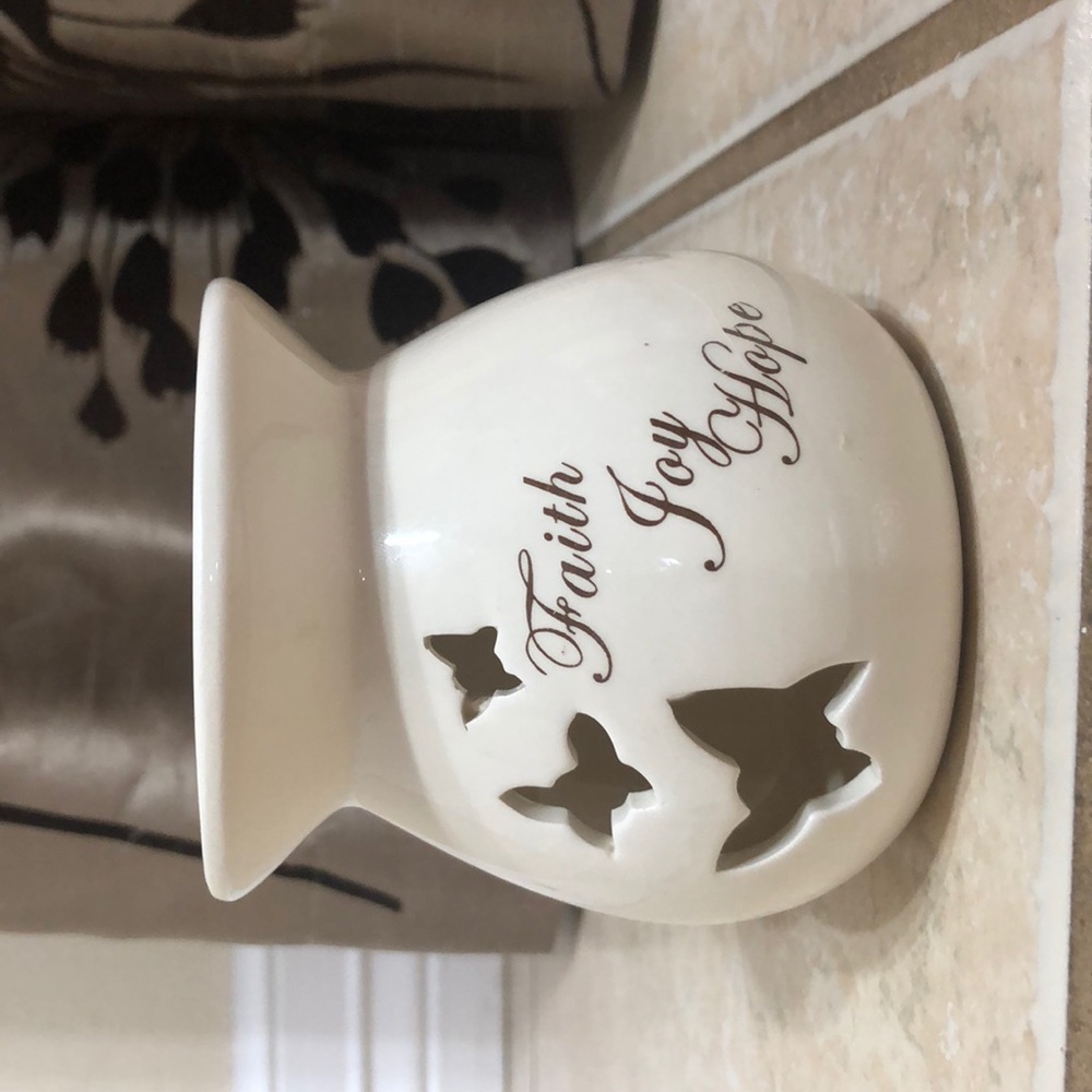 Small beige colored candle holder